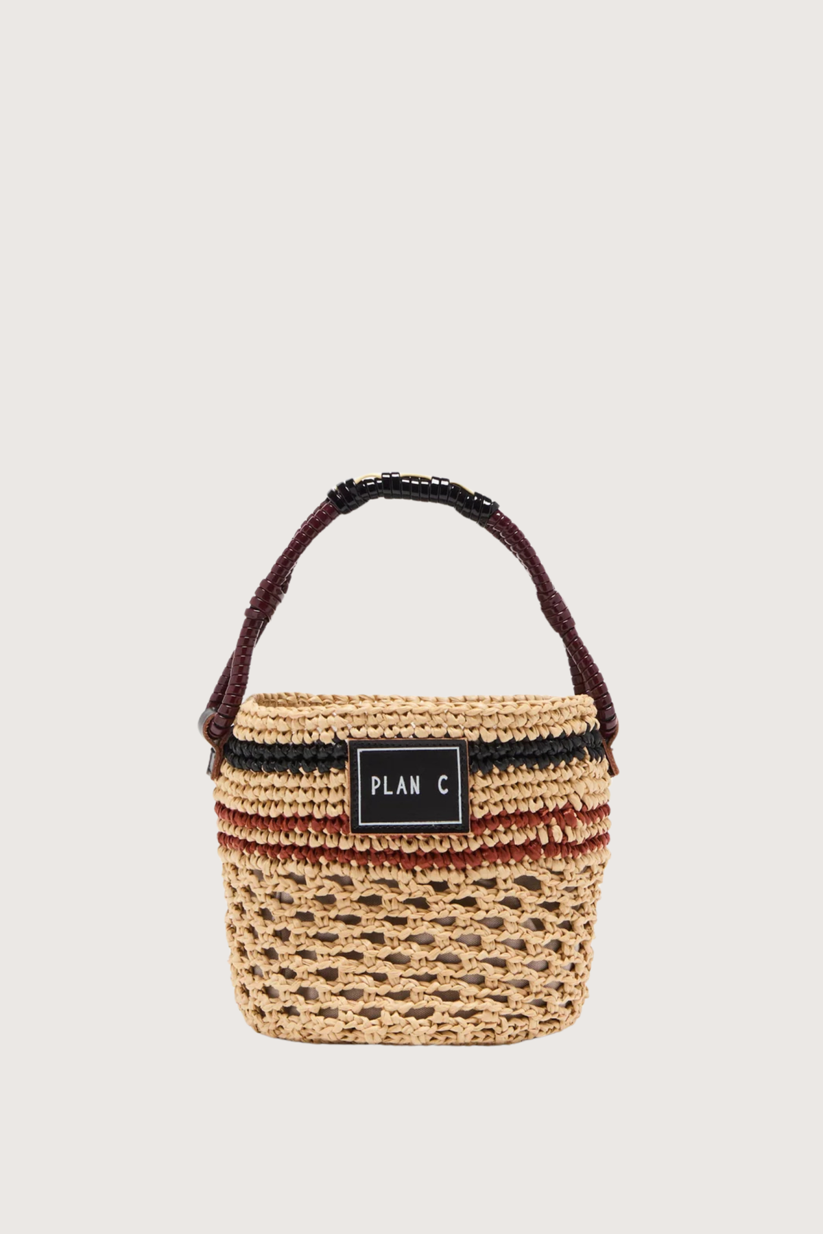 front profile Bucket Straw Bag natural Woven straw bucket bag
Contrast striped pattern
Braided handle
Signature logo patch