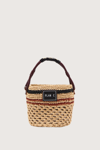front profile Bucket Straw Bag natural Woven straw bucket bag
Contrast striped pattern
Braided handle
Signature logo patch