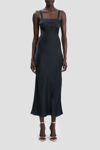 front profile model wearing Cami Dress With Side Slit navy Midi length
Cut on the bias
Self straps
Concealed zip with hook and  eye closure
Curved side-seam split
Skirt side split