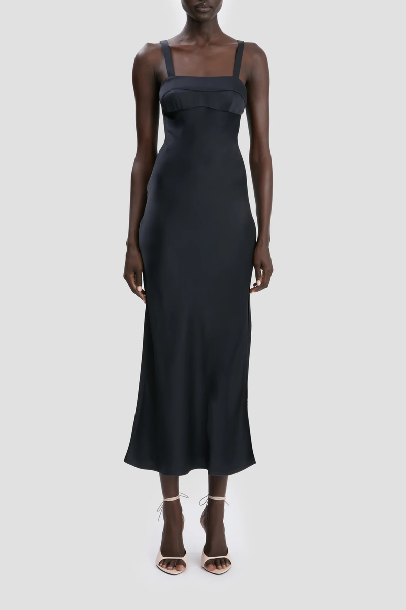 front profile model wearing Cami Dress With Side Slit navy Midi length
Cut on the bias
Self straps
Concealed zip with hook and  eye closure
Curved side-seam split
Skirt side split