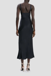 back profile model wearing Cami Dress With Side Slit navy Midi length
Cut on the bias
Self straps
Concealed zip with hook and  eye closure
Curved side-seam split
Skirt side split