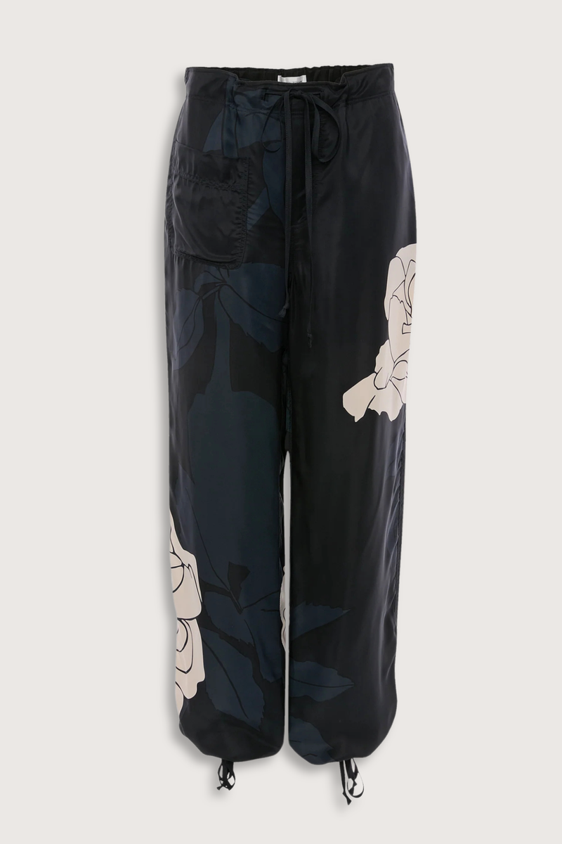 flat lay Cargo Print Trouser navy rose pink Printed viscose twill fabrication
Utilitarian cargo style
Elasticated waistband with waist ties
Leg cuffs with ties
Irregular pocket design
Back welt pocket with contrast stitching