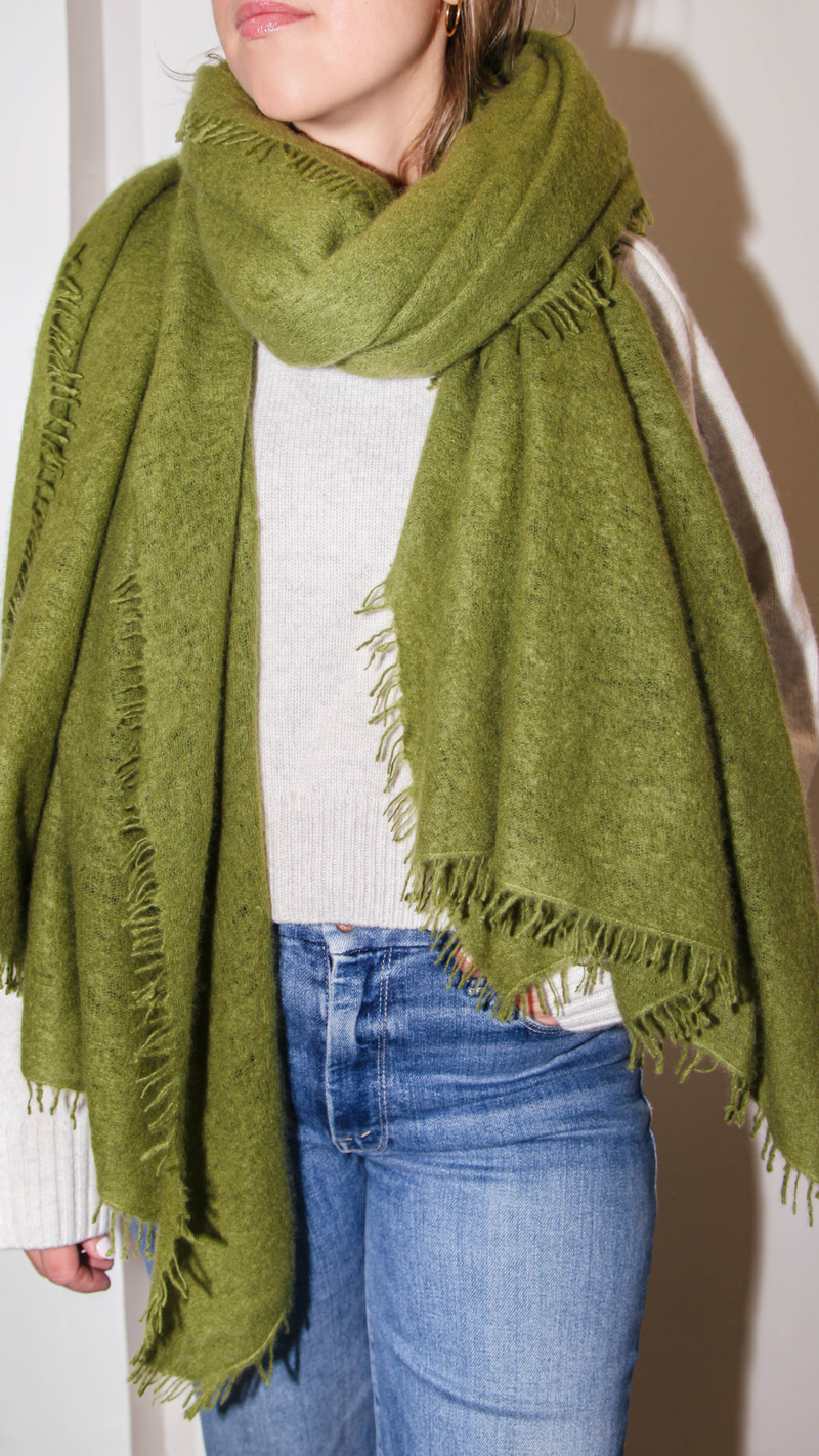 model wearing Cashmere Felted Stole Cedar Green 100% Cashmere
Handwoven
Natural Dyes
Super soft
Lightweight
Hand-fringed
Approximately 36"x80"