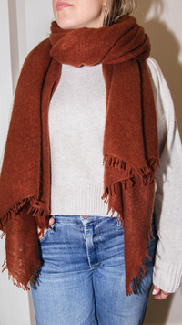 model wearing Cashmere Felted Stole Cinnamon 100% Cashmere
Handwoven
Natural Dyes
Super soft
Lightweight
Hand-fringed
Approximately 36"x80"