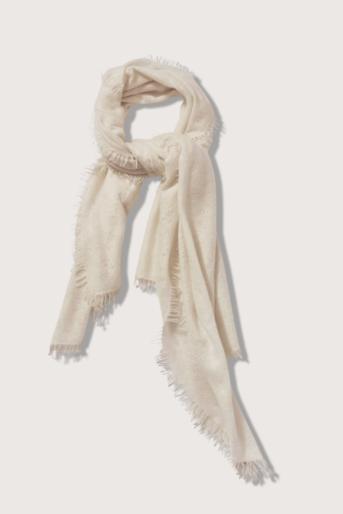 flat lay Cashmere Felted Stole Tofu 100% Cashmere
Handwoven
Natural Dyes
Super soft
Lightweight
Hand-fringed
Approximately 36"x80"