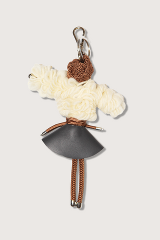 flat lay Catherine Key Ring charm Macramé  of a doll design white and gray