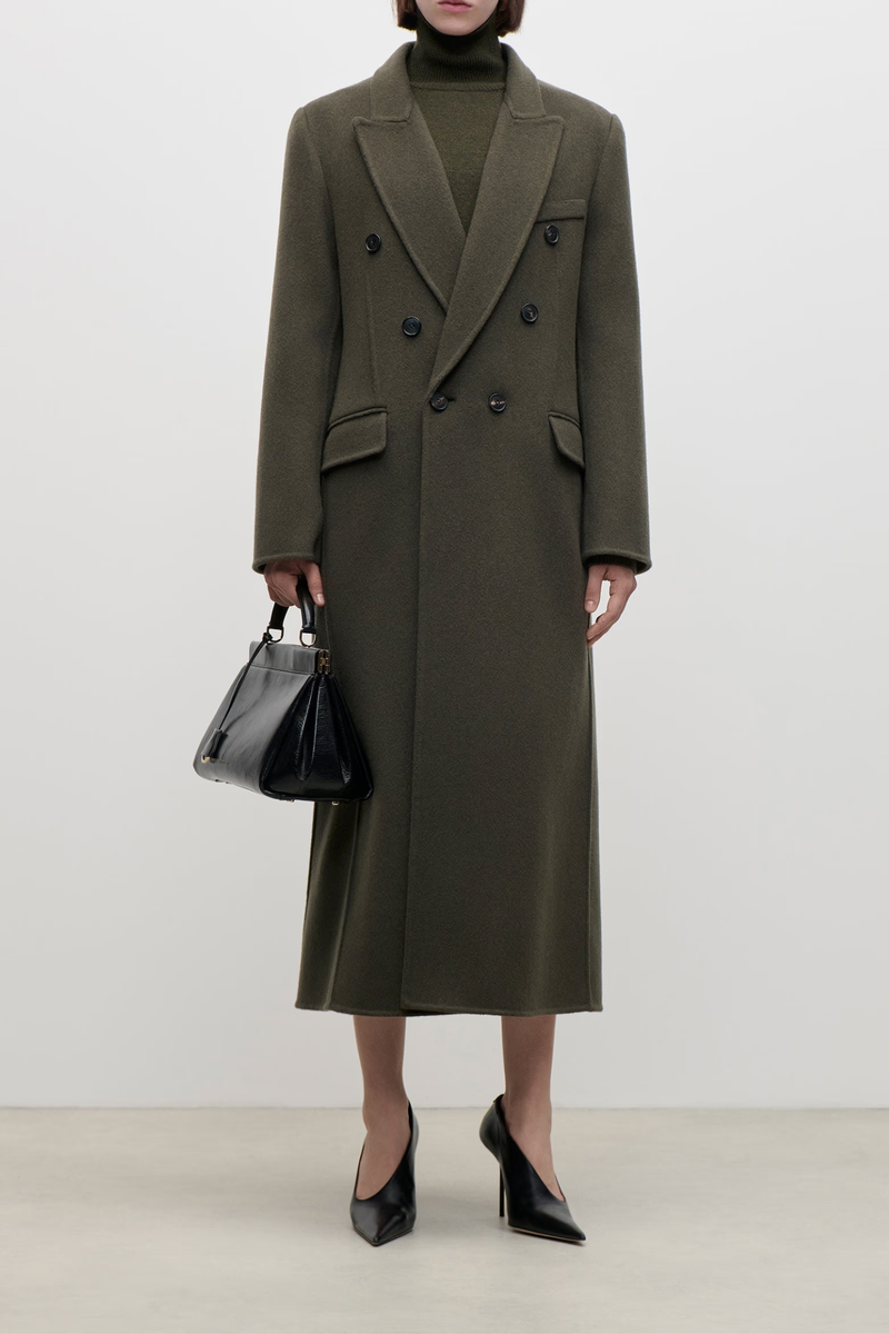 front profile model wearing Catrina Coat marsh green Tailored coat
Longline half double breasted coat
Oversized shoulder
Back vent
Half lined
Flap pockets
75% Virgin Wool 20% Polyamide 5% Cashmere