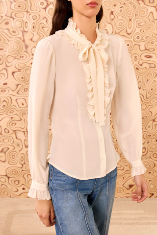 front profile model wearing Catroux Silk Blouse pearl white with ruffle neck and necktie