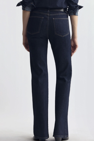 back profile model wearing  Celina Jean Indigo Rinse Classic five-pocket
Premium Japanese stretch denim
Mid-to-high-rise
Flare leg
Fits close through the waist and hips before opening into a soft elongating flare
98% Cotton, 2% Polyurethane
