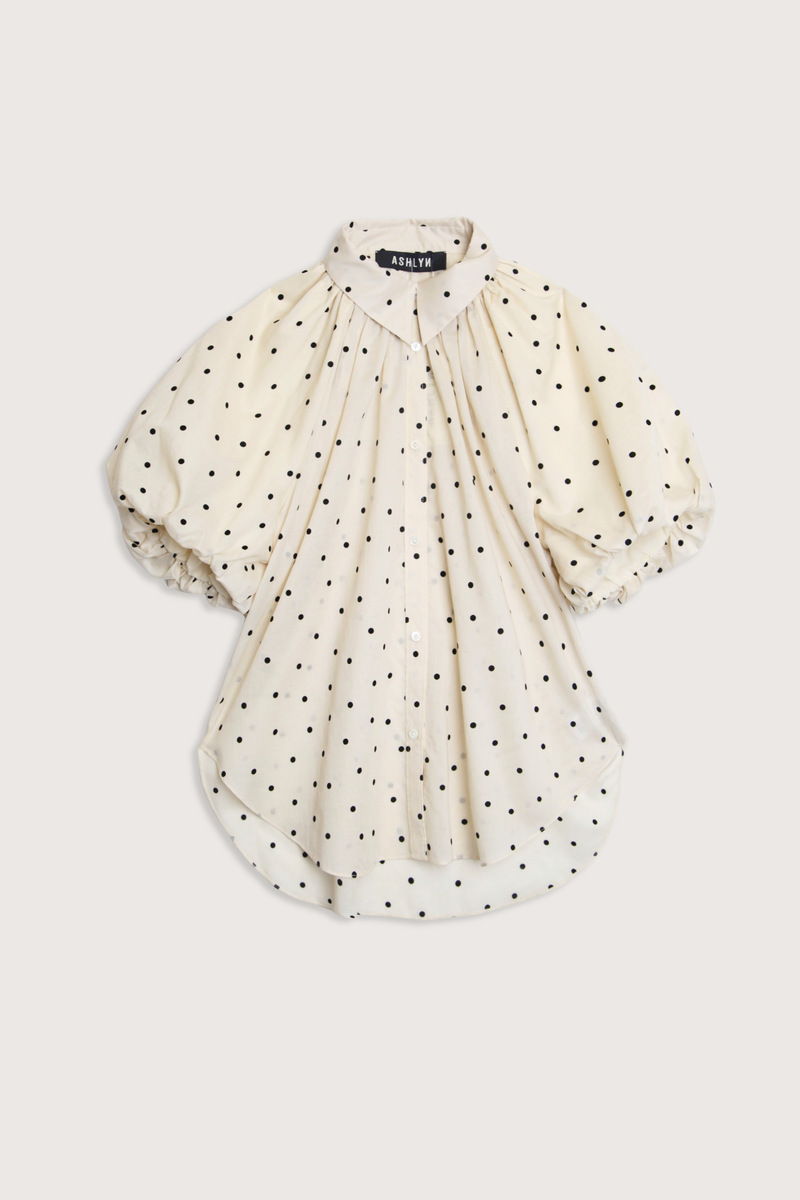 flat lay Charlie Polka Dot Shirt Black/Beige Gathered neckline
Opens into its voluminous, relaxed body
Mid-length puff sleeves
Made in New York
100% Cotton Voile&nbsp;