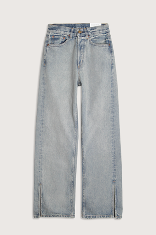 flat lay Charlot Split Hem Jean (Inseam 29") ed wash light blue wash Mid rise
Relaxed fit
Sitting just below the natural waist
Full length inseam
Clean fit that breaks from the high hip
Straight leg
Split hem cotton