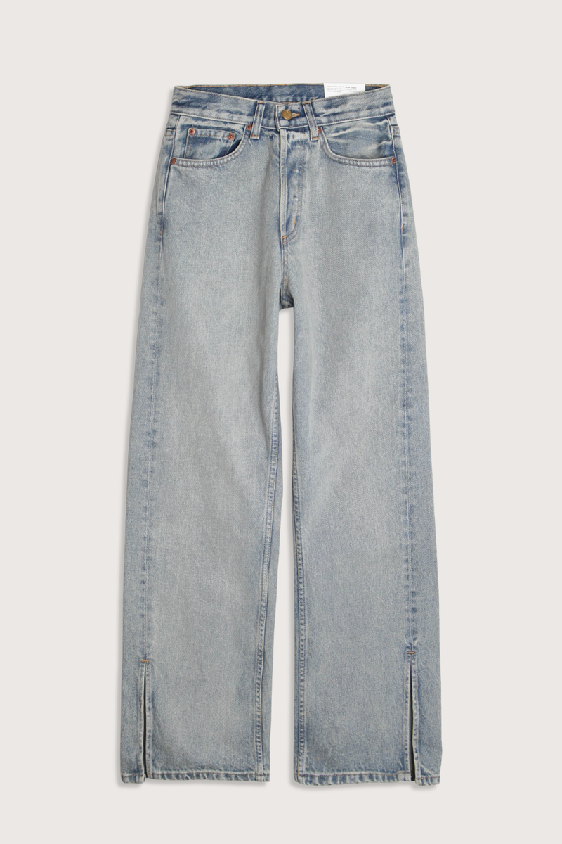 flat lay Charlot Split Hem Jean (Inseam 29") ed wash light blue wash Mid rise
Relaxed fit
Sitting just below the natural waist
Full length inseam
Clean fit that breaks from the high hip
Straight leg
Split hem cotton