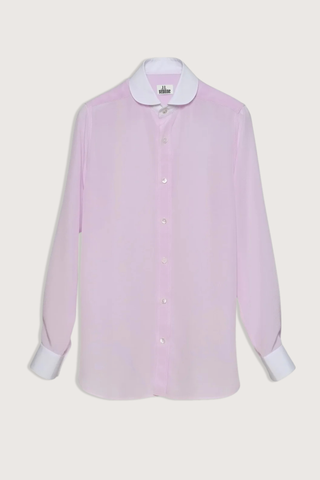 flat lay Chemise De Garcon Shirt pink and white Rounded collar
Pale pink silk crêpe-de-chine
Silk base, contrasted by the crisp white cotton poplin collar and cuffs
Straight cut - classic fit
Back yoke with pleat
Square cuff
Mother-of-pearl buttons
90% silk crepe de chine/10% two-ply cotton poplin