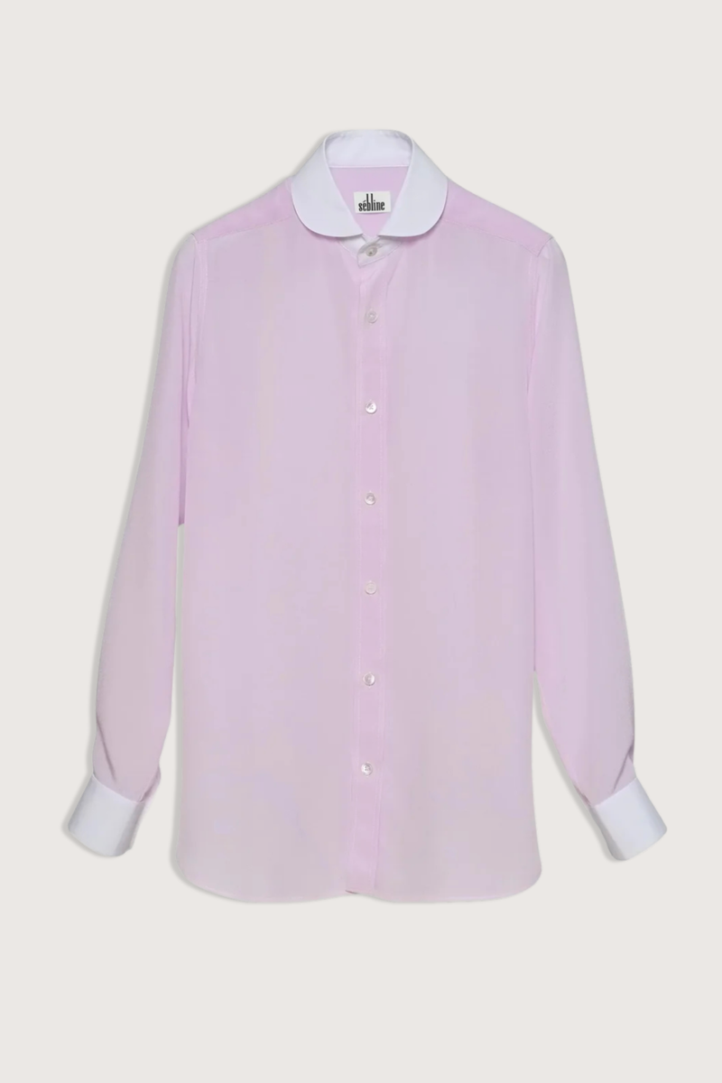 flat lay Chemise De Garcon Shirt pink and white Rounded collar
Pale pink silk crêpe-de-chine
Silk base, contrasted by the crisp white cotton poplin collar and cuffs
Straight cut - classic fit
Back yoke with pleat
Square cuff
Mother-of-pearl buttons
90% silk crepe de chine/10% two-ply cotton poplin