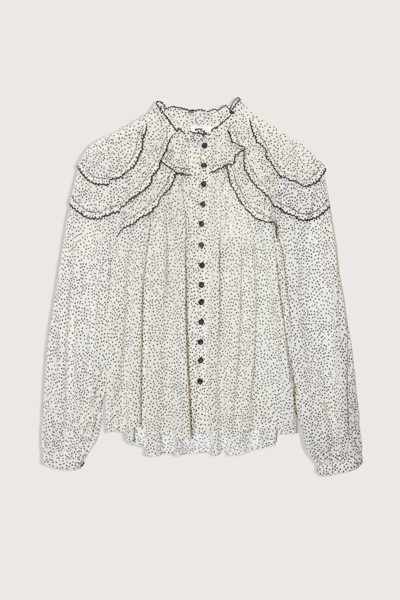 flat lay Christa Printed Top ecru with black dots Gathered printed cotton voile blouse
All-over polka dot print
Relaxed fit
Round neckline with gathered trim
Front button closure
Gathered detailing at the front and shoulders
Long sleeves
Buttoned cuffs
Curved hem
100% Cotton