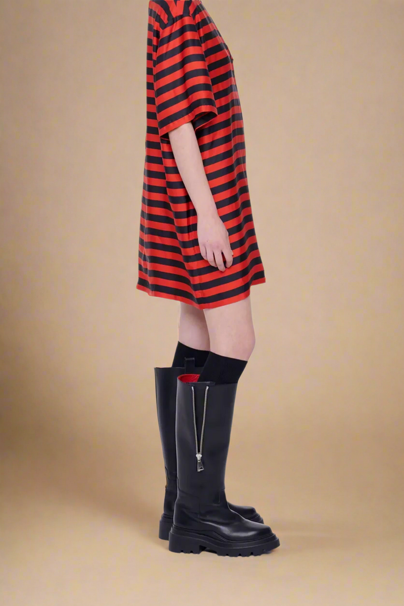 side profile model wearing Chunky Sole Leather black Boots  with side silver zipper