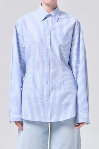front profile model wearing Cinch Shirt Webb Stripe light blue white stripe Tailored style
Subtle front cinch detailing
Relaxed silhouette
100% Organic Cotton