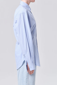 side profile model wearing Cinch Shirt Webb Stripe light blue white stripe Tailored style
Subtle front cinch detailing
Relaxed silhouette
100% Organic Cotton
