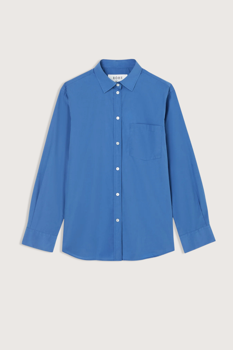 flat lay Classic Fit Shirt pacific blue A classic button-down
Deep blue cotton
Relaxed fit
Patch pocket at the chest
Subtly rounded hem
100% cotton