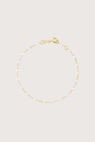 flat lay Classic Gigi Bracelet 6.7" 18K Yellow Gold White White resin jewel
6.7" chain with adjustable clasp at 6.3"