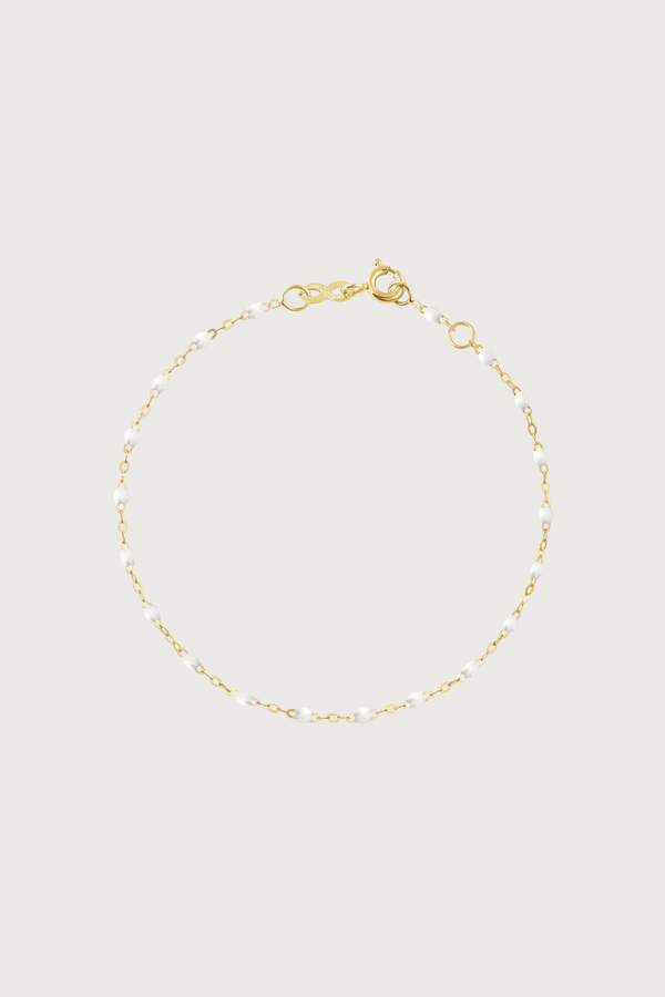 flat lay Classic Gigi Bracelet 6.7" 18K Yellow Gold White White resin jewel
6.7" chain with adjustable clasp at 6.3"