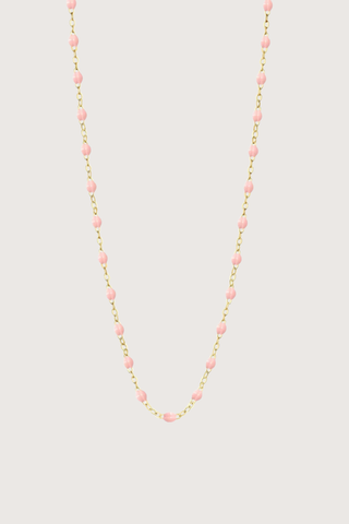 flat lay Classic Gigi Necklace 16.5" 18K Yellow Gold Baby Pink Baby Pink resin jewels
varying 16.5" options and solid black jewels
16.5" chain with adjustable clasp at 16.1"