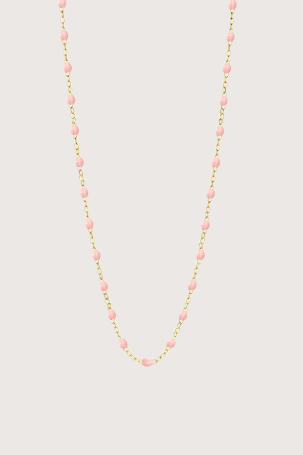 flat lay Classic Gigi Necklace 16.5" 18K Yellow Gold Baby Pink Baby Pink resin jewels
varying 16.5" options and solid black jewels
16.5" chain with adjustable clasp at 16.1"