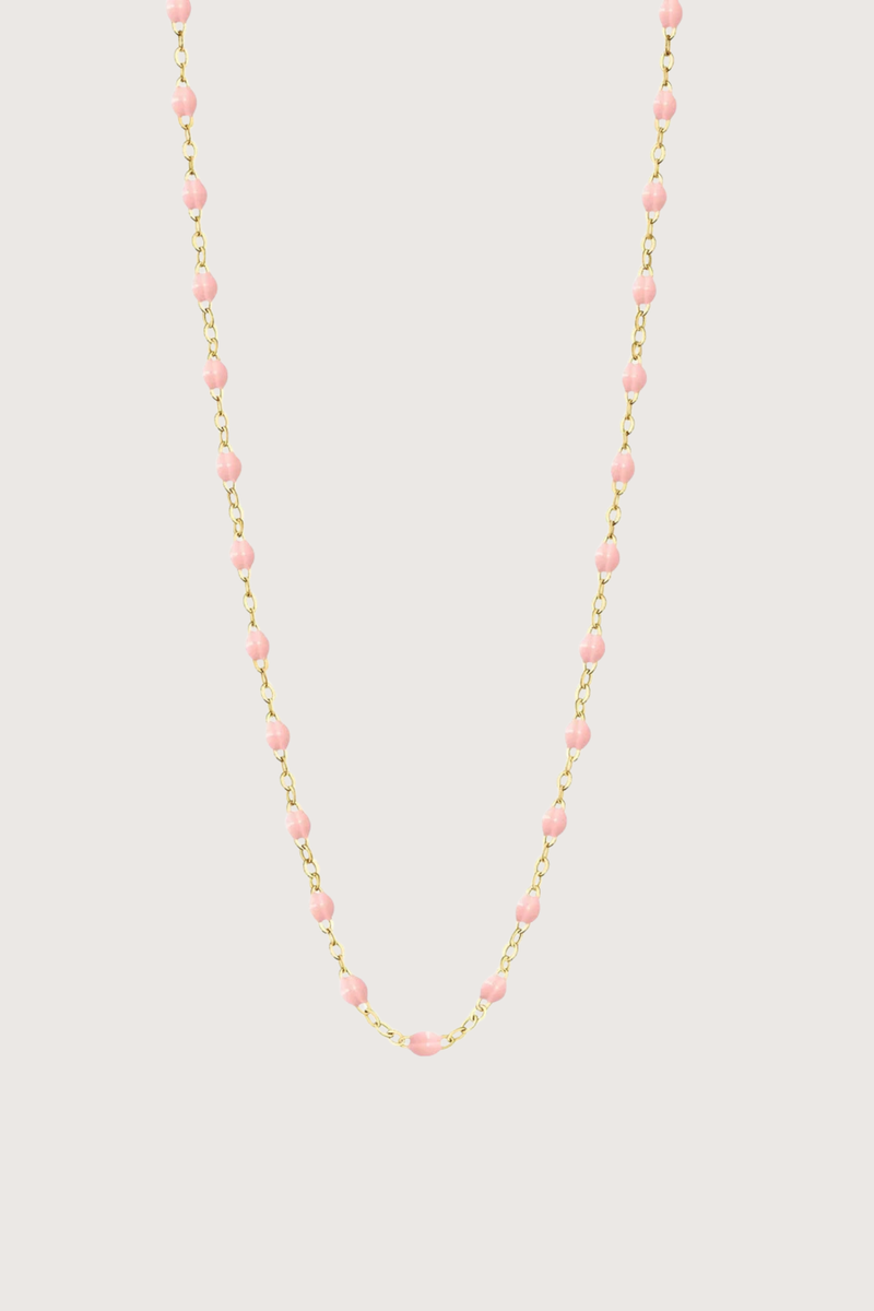 flat lay Classic Gigi Necklace 16.5" 18K Yellow Gold Baby Pink Baby Pink resin jewels
varying 16.5" options and solid black jewels
16.5" chain with adjustable clasp at 16.1"