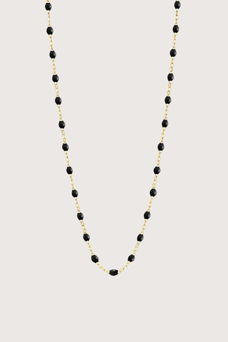 flat lay Classic Gigi Necklace 16.5" 18K Yellow Gold Black Black resin jewels
varying 16.5" options and solid black jewels
16.5" chain with adjustable clasp at 16.1"