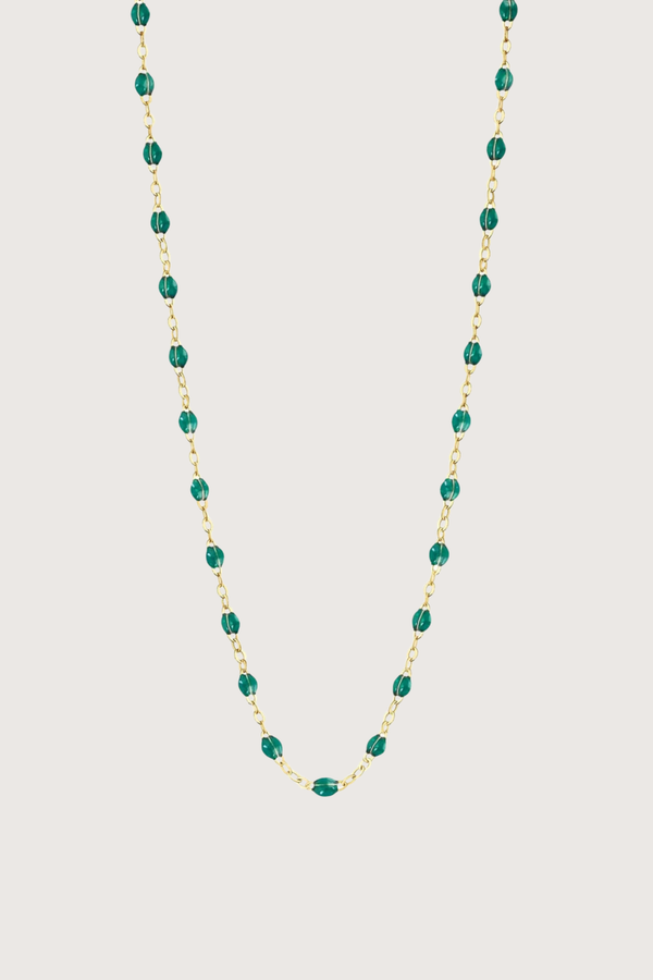 flat lay Classic Gigi Necklace 16.5" 18K Yellow Gold Emerald Emerald resin jewels
varying 16.5" options and solid black jewels
16.5" chain with adjustable clasp at 16.1"