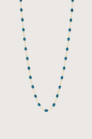 flat lay Classic Gigi Necklace 16.5" 18K Yellow Gold Jungle Jungle blue resin jewels
varying 16.5" options and solid black jewels
16.5" chain with adjustable clasp at 16.1"
