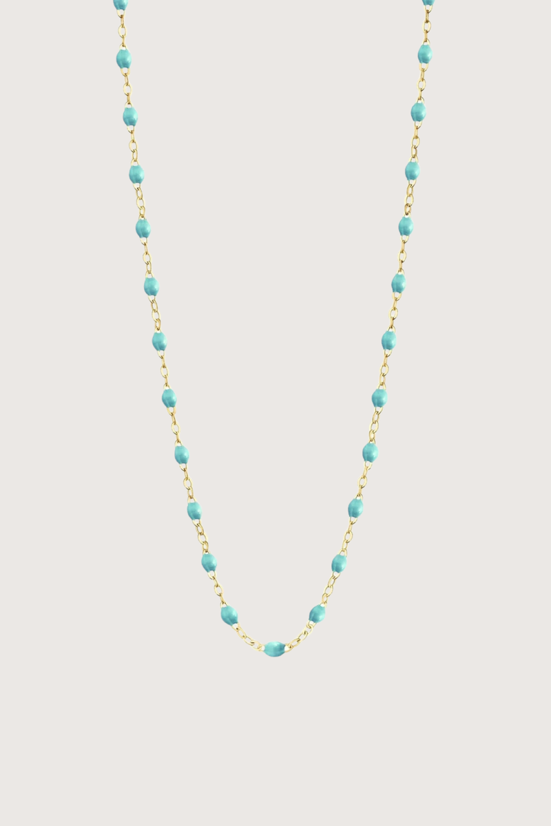 flat lay Classic Gigi Necklace 16.5" 18K Yellow Gold Lagoon Lagoon resin jewels
varying 16.5" options and solid black jewels
16.5" chain with adjustable clasp at 16.1"