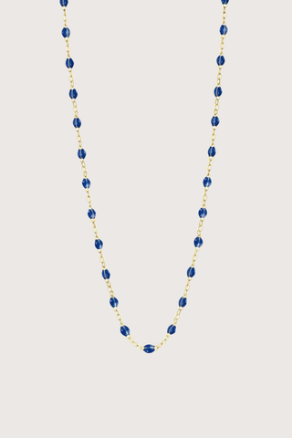flat lay Classic Gigi Necklace 16.5" 18K Yellow Gold Lapis Lapis resin jewels
varying 16.5" options and solid black jewels
16.5" chain with adjustable clasp at 16.1"