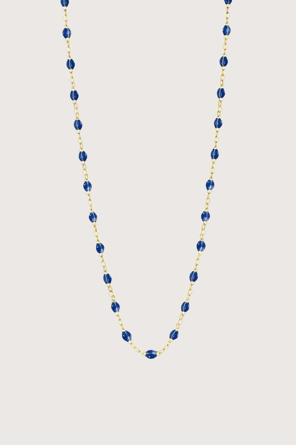 flat lay Classic Gigi Necklace 16.5" 18K Yellow Gold Lapis Lapis resin jewels
varying 16.5" options and solid black jewels
16.5" chain with adjustable clasp at 16.1"