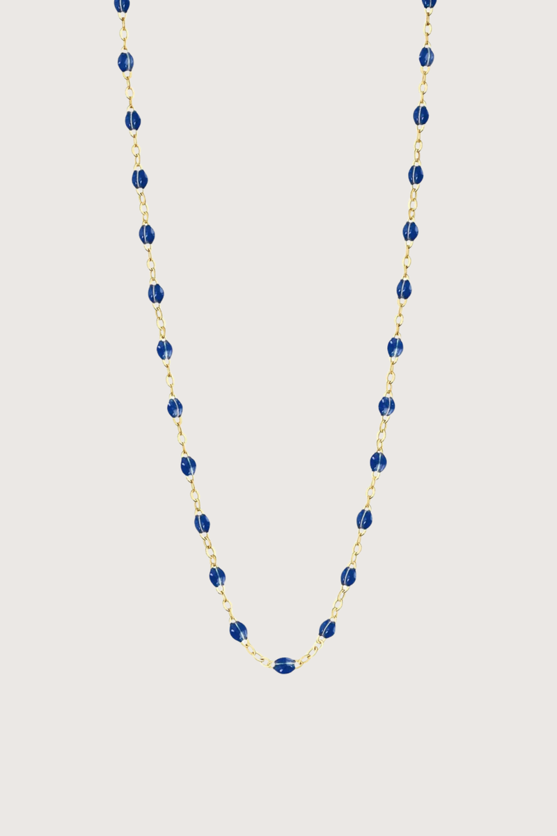 flat lay Classic Gigi Necklace 16.5" 18K Yellow Gold Lapis Lapis resin jewels
varying 16.5" options and solid black jewels
16.5" chain with adjustable clasp at 16.1"