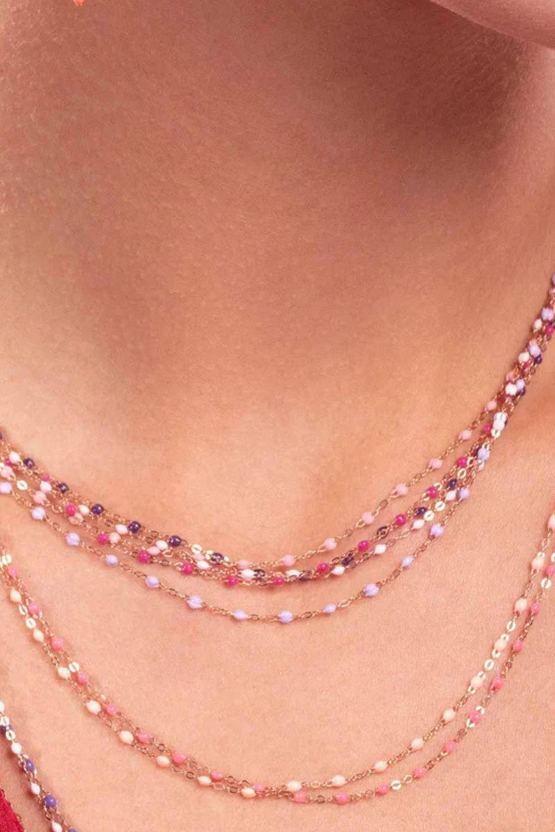 model wearing  Classic Gigi Necklace 16.5" 18K Yellow Gold Lilac Lilac resin jewels
varying 16.5" options and solid black jewels
16.5" chain with adjustable clasp at 16.1"