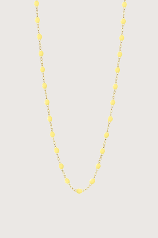 flat lay Classic Gigi Necklace 16.5" 18K Yellow Gold Mimosa Mimosa yellow resin jewels
varying 16.5" options and solid black jewels
16.5" chain with adjustable clasp at 16.1"