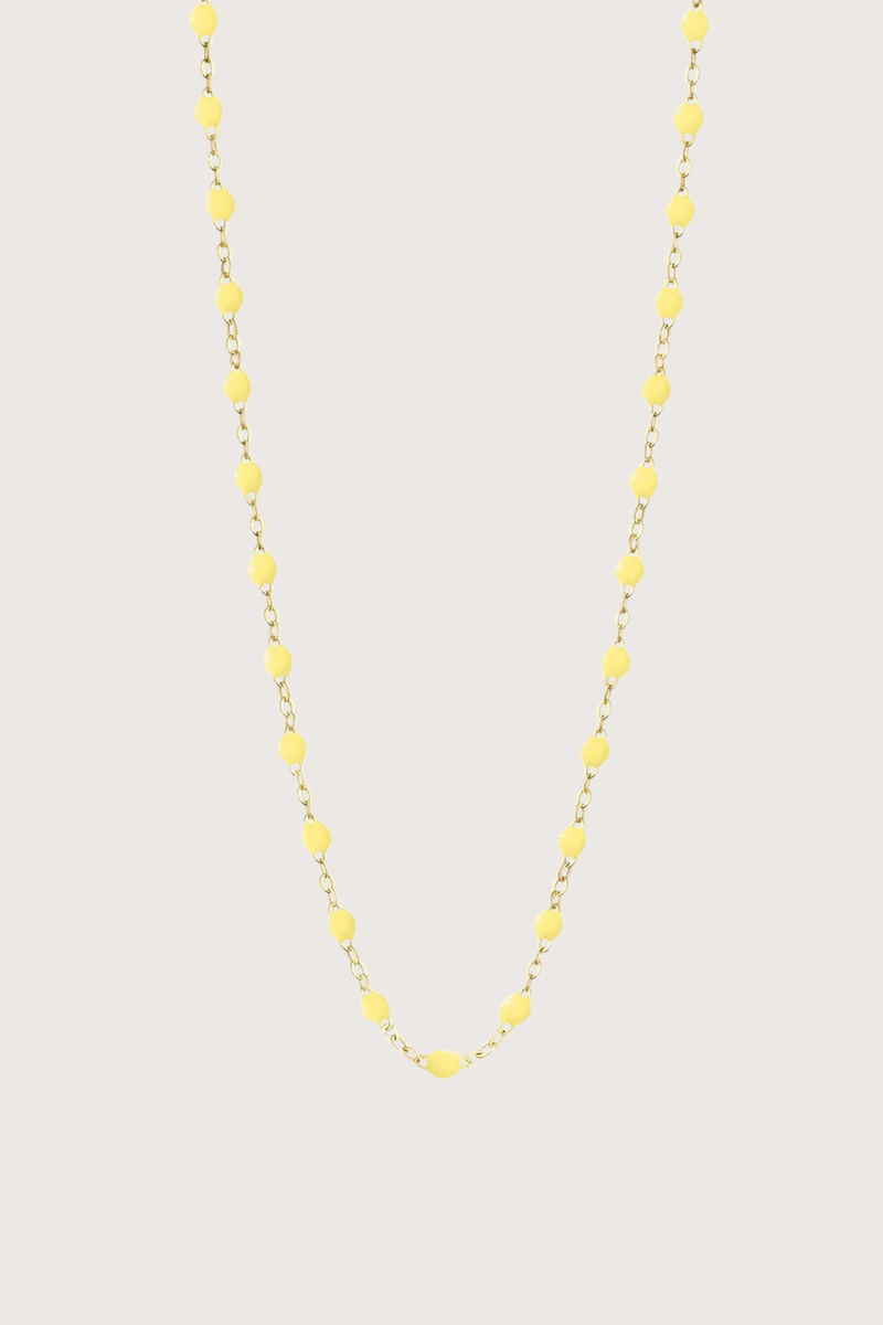 flat lay Classic Gigi Necklace 16.5" 18K Yellow Gold Mimosa Mimosa yellow resin jewels
varying 16.5" options and solid black jewels
16.5" chain with adjustable clasp at 16.1"