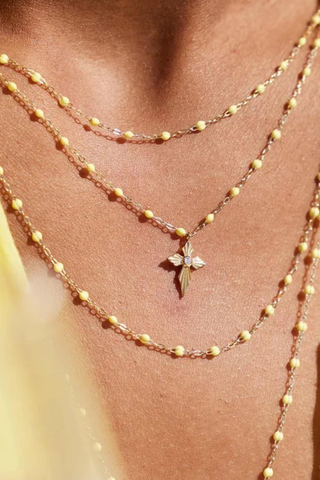 model wearing Classic Gigi Necklace 16.5" 18K Yellow Gold Mimosa Mimosa yellow resin jewels
varying 16.5" options and solid black jewels
16.5" chain with adjustable clasp at 16.1"