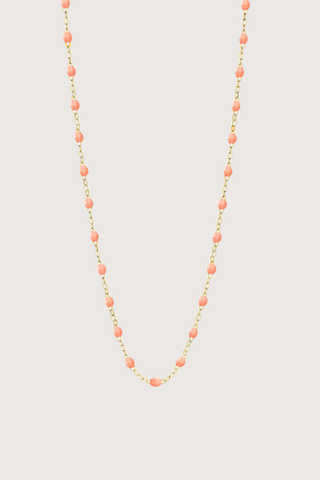 flat lay Classic Gigi Necklace 16.5" 18K Yellow Gold Salmon Salmon resin jewels
varying 16.5" options and solid black jewels
16.5" chain with adjustable clasp at 16.1"
