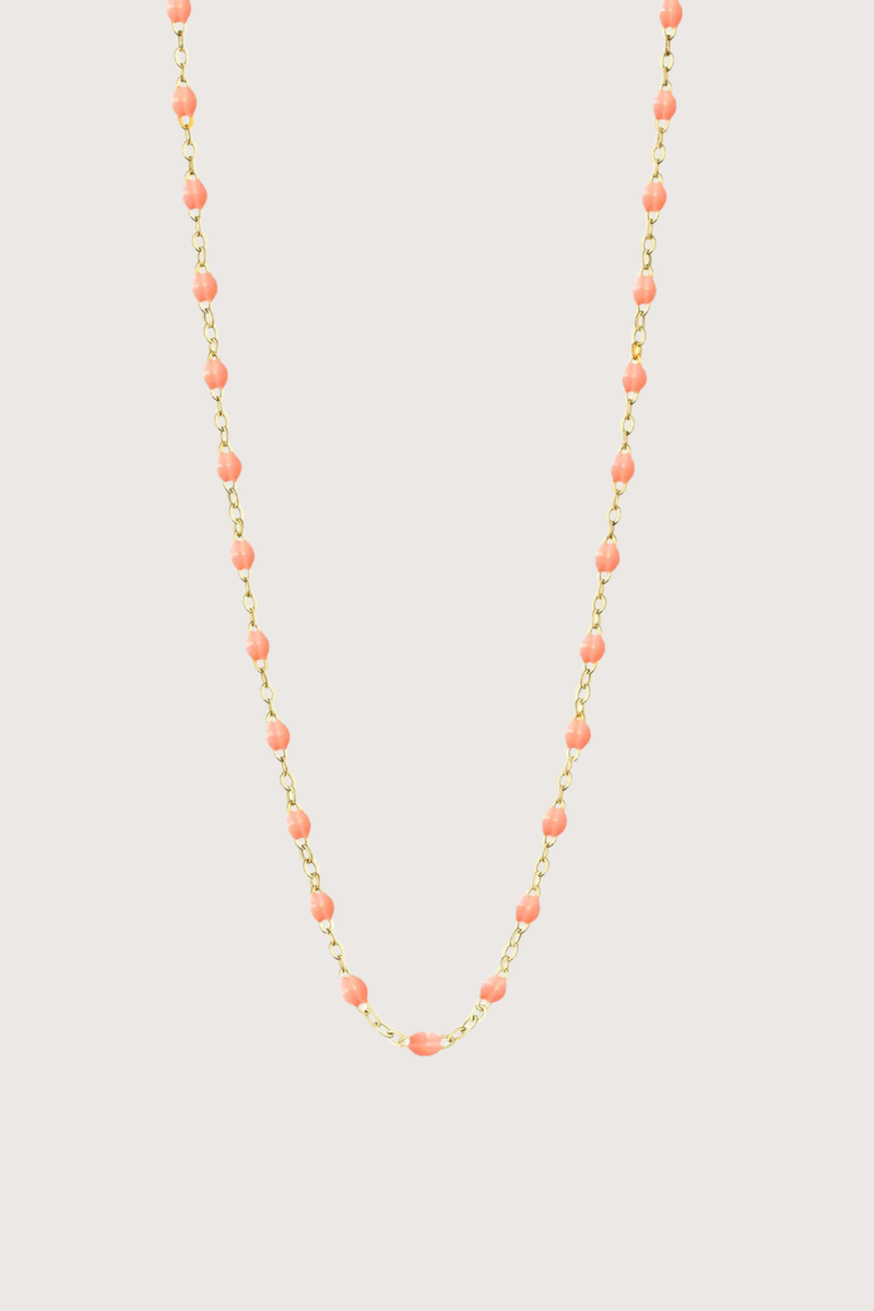 flat lay Classic Gigi Necklace 16.5" 18K Yellow Gold Salmon Salmon resin jewels
varying 16.5" options and solid black jewels
16.5" chain with adjustable clasp at 16.1"