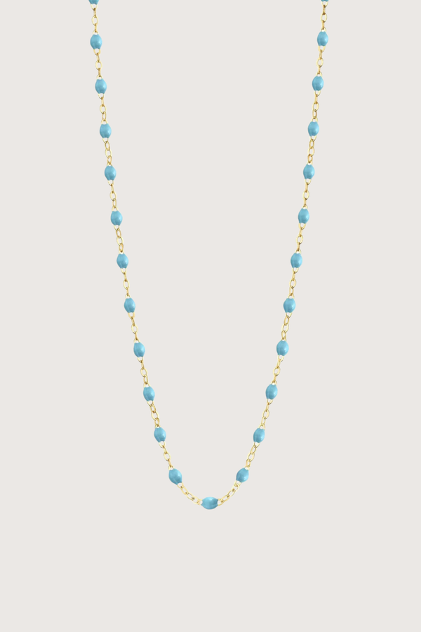 flat lay Classic Gigi Necklace 16.5" 18K Yellow Gold Turquoise Turquoise resin jewels
varying 16.5" options and solid black jewels
16.5" chain with adjustable clasp at 16.1"