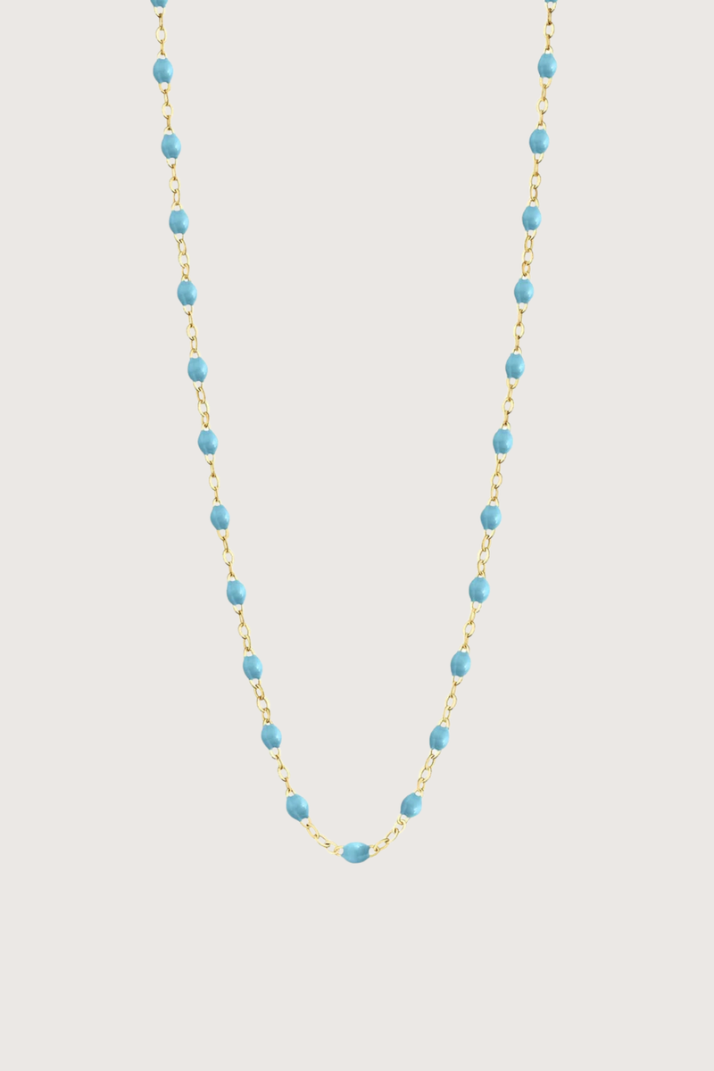flat lay Classic Gigi Necklace 16.5" 18K Yellow Gold Turquoise Turquoise resin jewels
varying 16.5" options and solid black jewels
16.5" chain with adjustable clasp at 16.1"