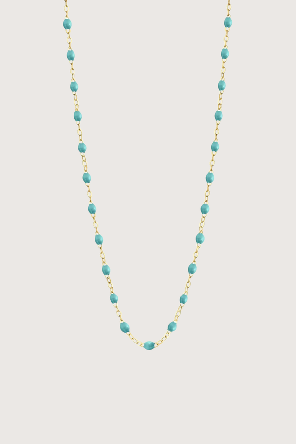flat lay Classic Gigi Necklace 16.5" 18K Yellow Gold Turquoise Green Turquoise Green resin jewels
varying 16.5" options and solid black jewels
16.5" chain with adjustable clasp at 16.1"