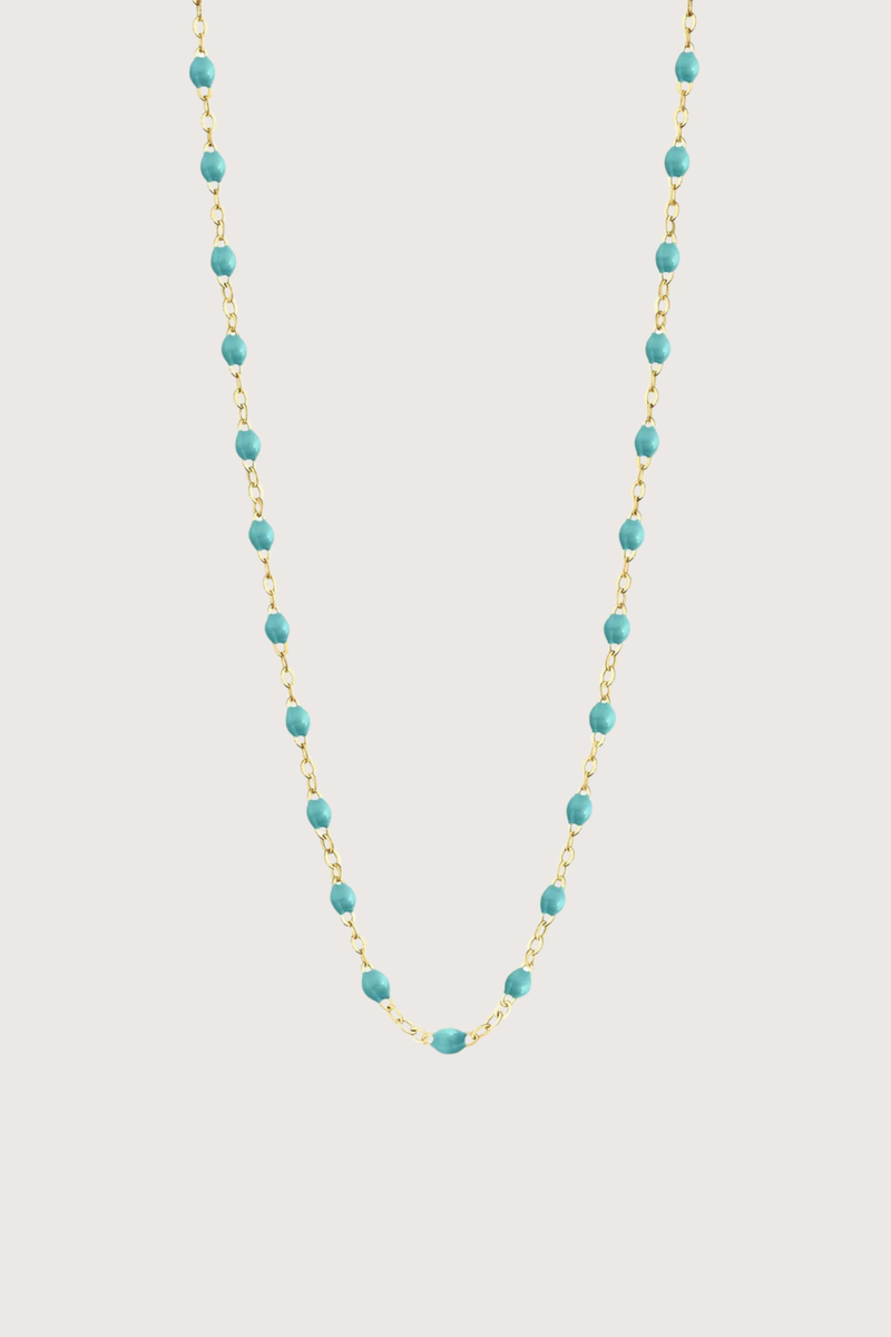 flat lay Classic Gigi Necklace 16.5" 18K Yellow Gold Turquoise Green Turquoise Green resin jewels
varying 16.5" options and solid black jewels
16.5" chain with adjustable clasp at 16.1"
