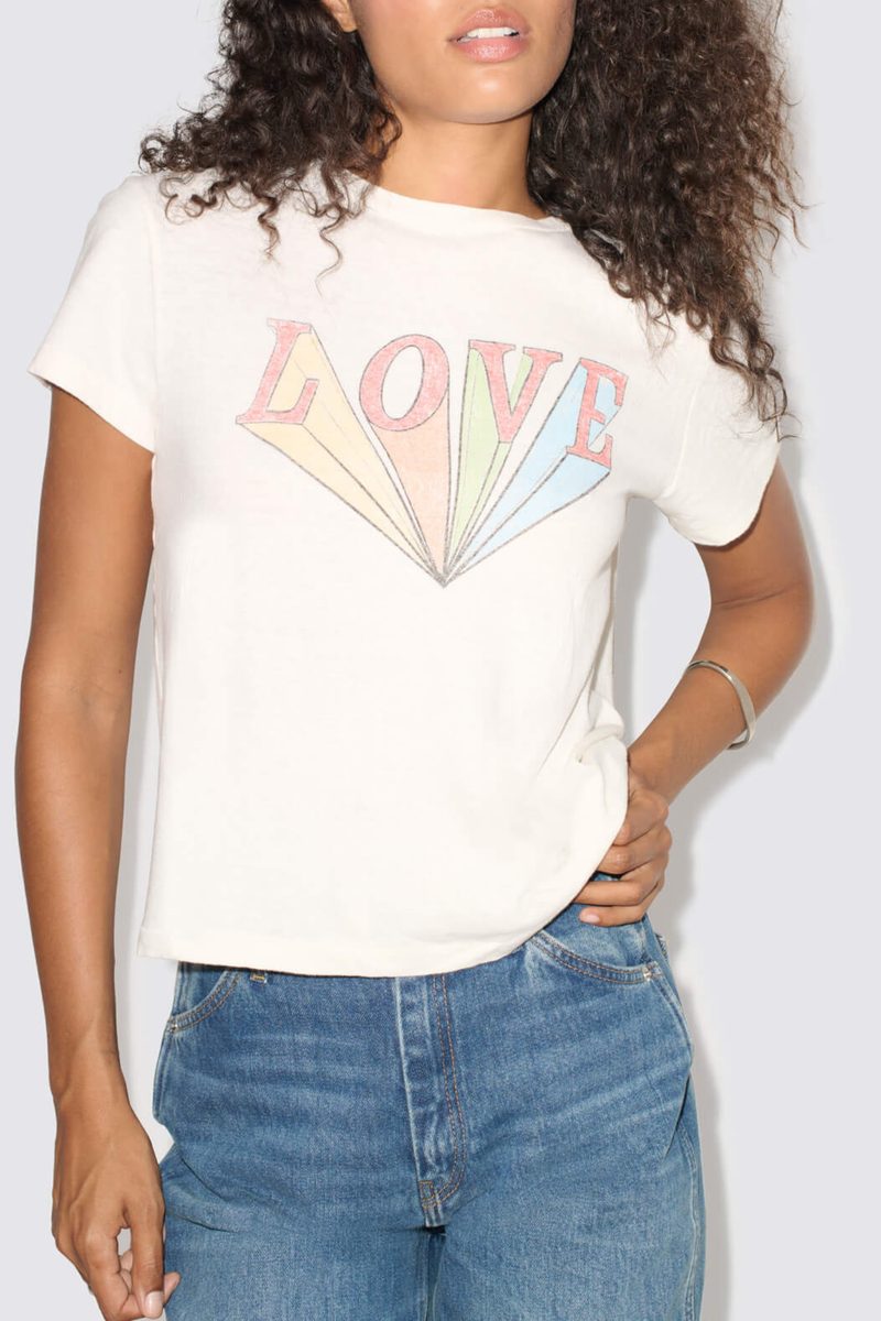 front profile model wearing  Classic Tee LOVE Rainbow white with multi-color graphic Classic fit t-shirt
Collectible vintage inspired graphic
Crewneck
Regular length
Short sleeves
Recycled Heritage Cotton Jersey
70% Cotton 30% Recycled Cotton