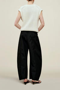 back profile model wearing Clemence Compact Cotton horseshoe Pant black with adjustale drawstring and pleats