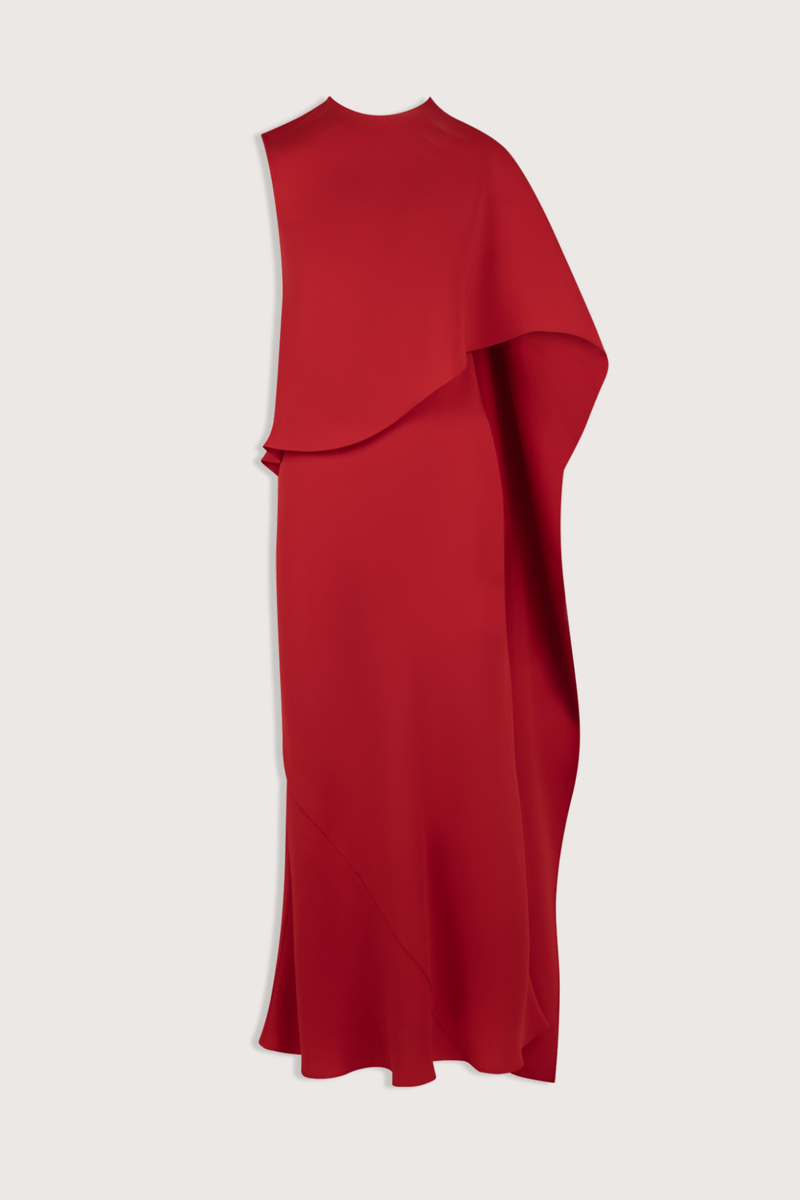flat lay Clementine Dress red silk Midi length bias dress
Silk crepe
Asymmetrical cape that drapes from front to back
Slim fitting through body
Natural stretch from the bias cut fabric
Cape hangs loose over top and drapes freely at the back
Center-back zipper for closure.