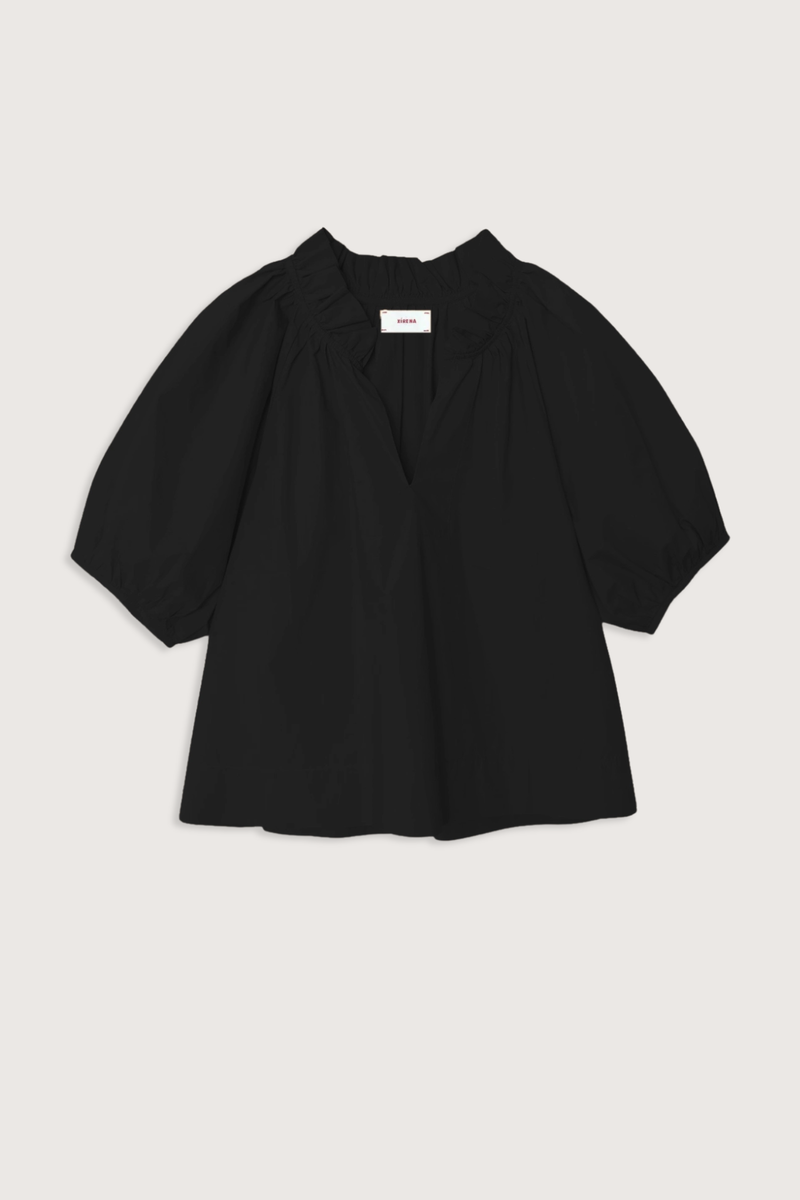 flat lay Clementine Top black Crisp paper poplin
Deep V-neck
Ruffle detailing
Shirred puff sleeves
100% Cotton
