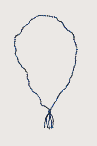 flat lay Cobalt Tassel Necklace Round blue lapis beads
Softly draped tassel
Can be worn long or layered
Necklace length 80cm
Tassel length 10cm